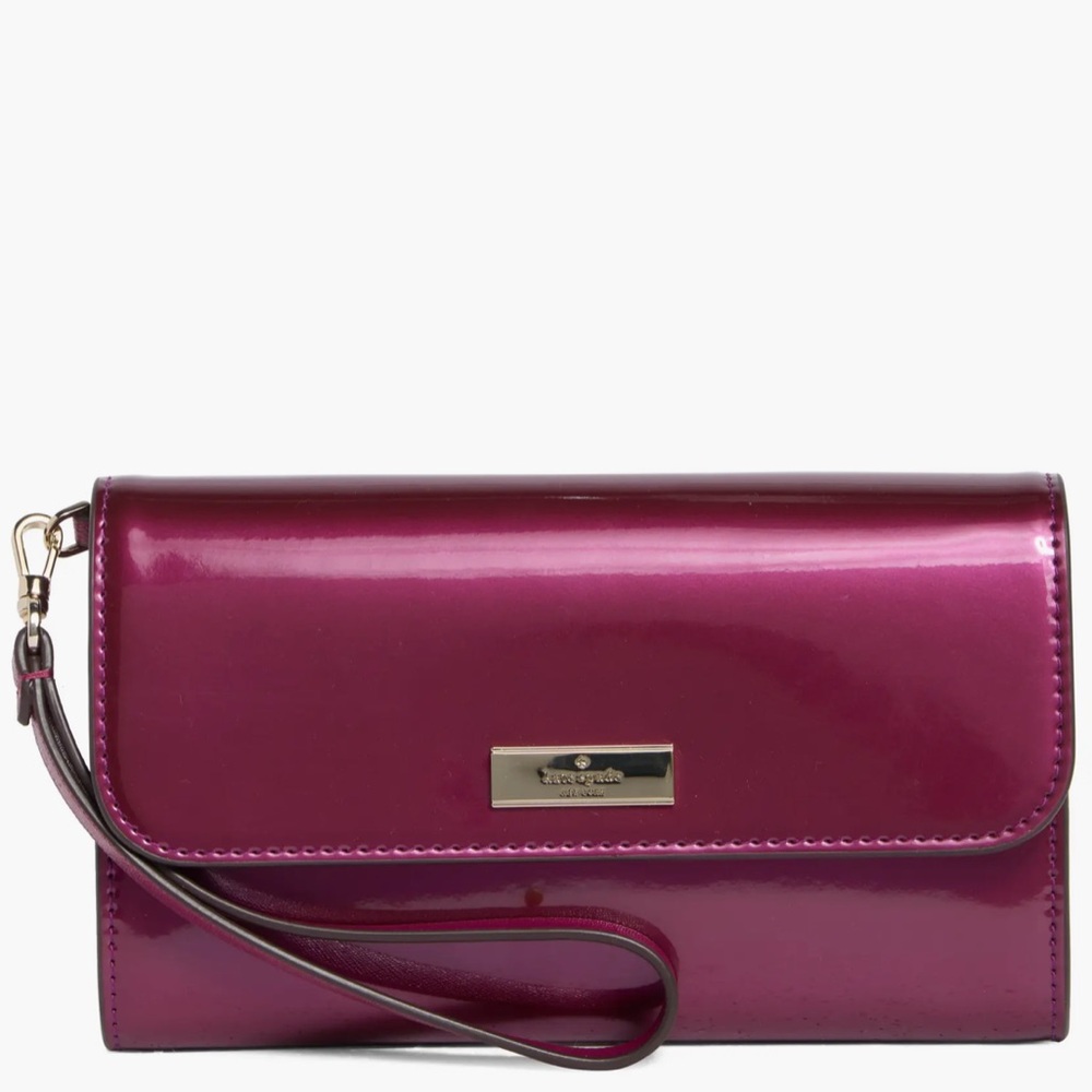 Kate Spade Kenzie wristlet wallet in dark raspberry